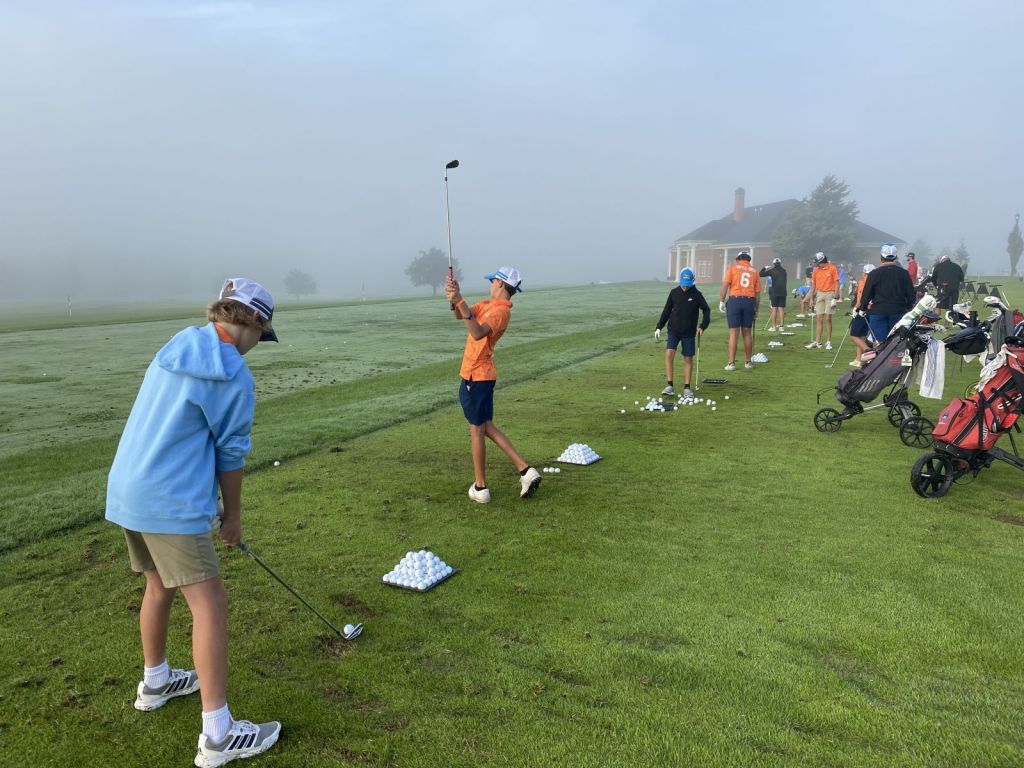 junior class at the driving range